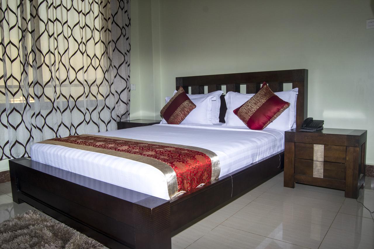 Flomi Hotel Morogoro Стая снимка